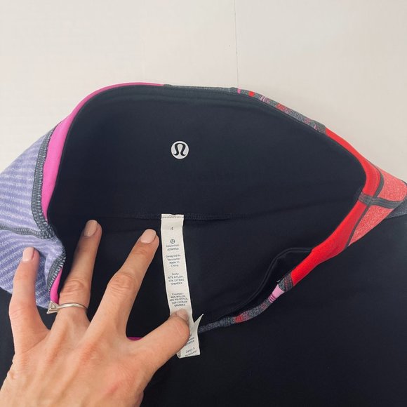 Lululemon balck capris with printed waist band pink, red, gray blue, stripped 4 - Picture 1 of 6